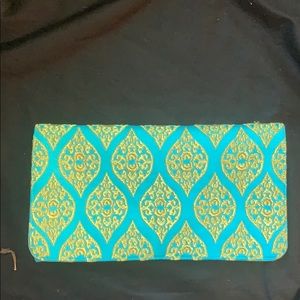 Beautiful gold and turquoise silk cluch purse